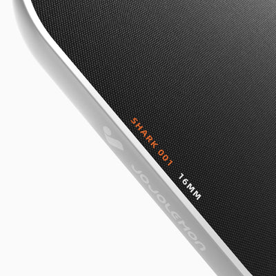 Close-up of the durable edge guard on the JOJOLEMON Shark-001 paddle, preventing damage from court strikes.