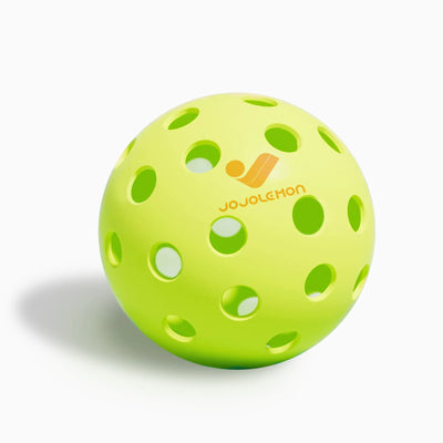 Vibrant green JOJOLEMON outdoor pickleball, easy to track against various court backgrounds.